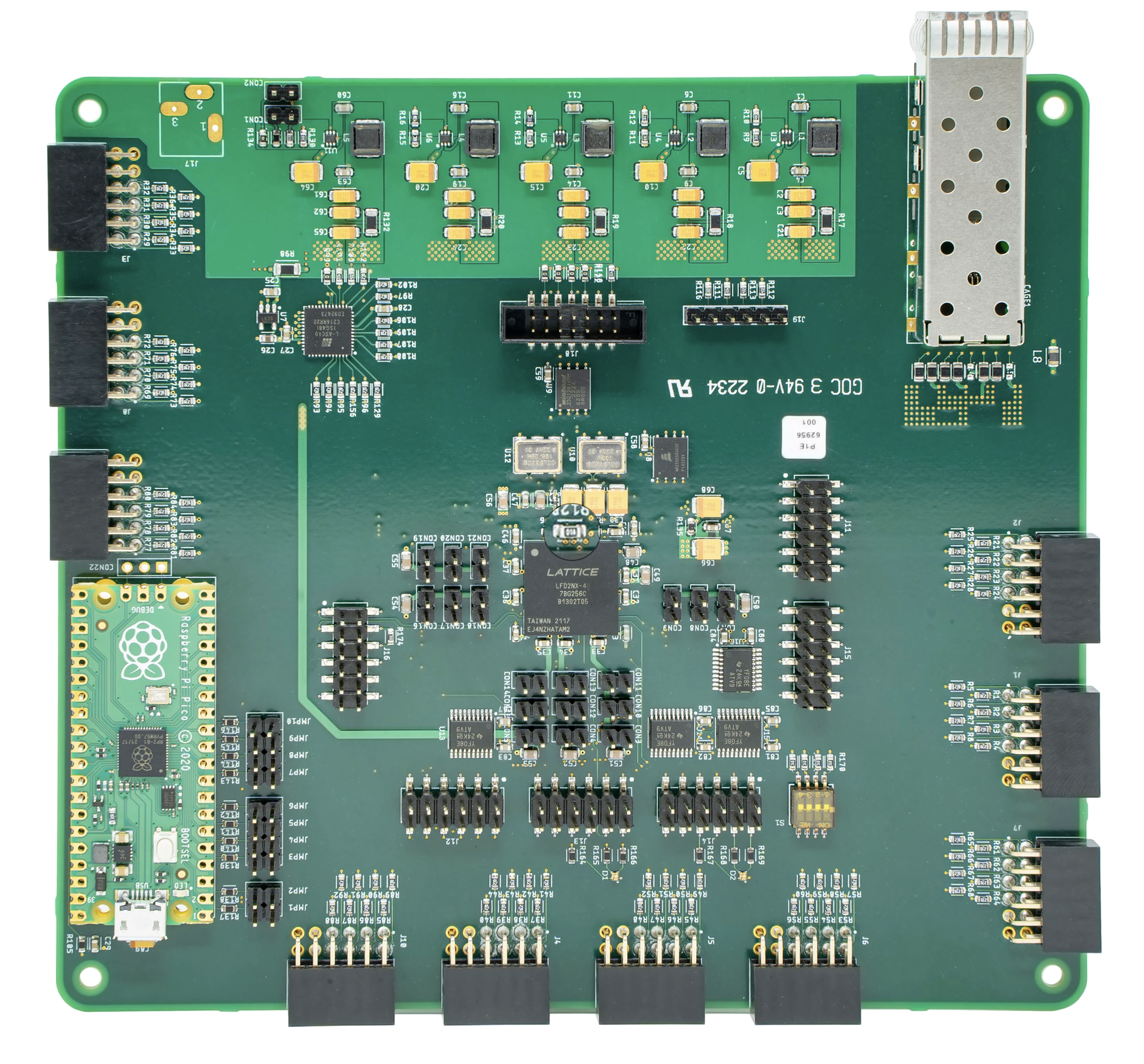 The Galaxia® Space Development board

The image shows a top view of the PCB. Along the top are the five PSU's. Around the left, right, and bottom edges are 10 PMOD connectors for accessing the IO of the FPGA. On the bottom left is Raspberry Pi Pico which can be used for applying test stimulus to the FPGA, and in the middle is the FPGA itself with headers to allow IO voltage configuration and to attach the Lattice programming tools.